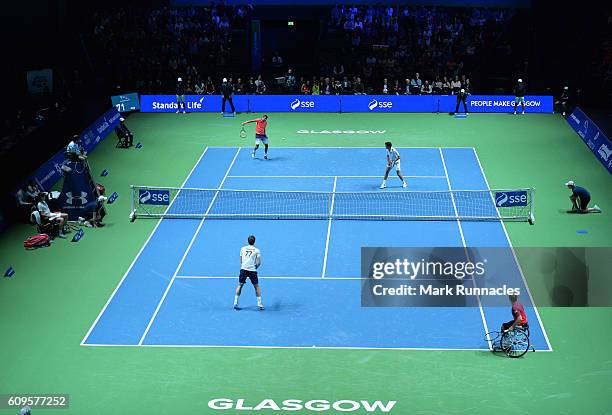 Gold Medal Paralympian Gordon Reid replaces Jamie Murray during the doubles match between Andy Murray and Jamie Murray of Scotland and Tim Henman of...