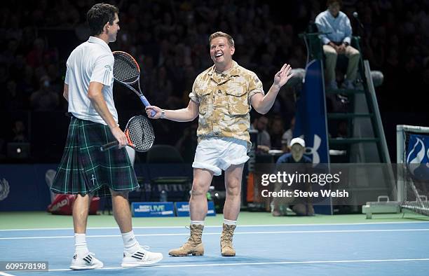 Gary Tank Commander arrives on court to play with Tim Henman in doubles action during Andy Murray Live presented by SSE at the SSE Hydro on September...