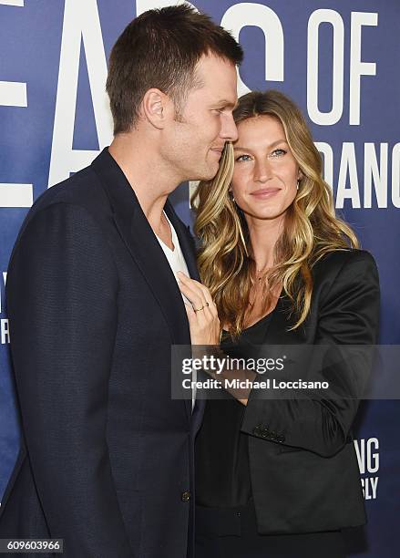 Professional Football player Tom Brady and wife, model Gisele Bundchen attend National Geographic's "Years Of Living Dangerously" new season world...