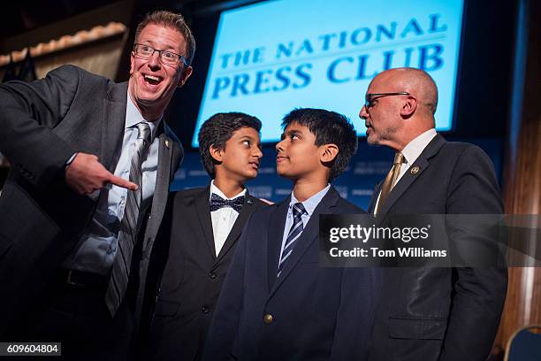 Reps. Derek Kilmer, D-Wash., far left, and Ted Deutch, D-Fla., talk with co-champions of the Scripps National Spelling Bee Jairam Hathwar left, and...