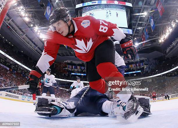 Sidney Crosby of Team Canada trips over Jaroslav Halak of Team Europe during the first period at the World Cup of Hockey tournament at the Air Canada...