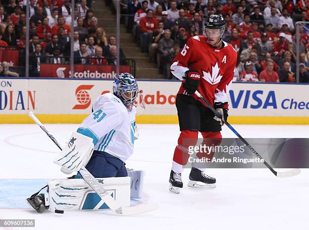 Jaroslav Halak of Team Europe makes a pad save with Jonathan Toews of Team Canada in front during the World Cup of Hockey 2016 at Air Canada Centre...