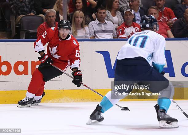 Brad Marchand of Team Canada looks for a pass with pressure from Christian Ehrhoff of Team Europe during the World Cup of Hockey 2016 at Air Canada...