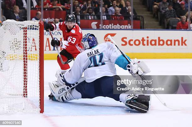 Jaroslav Halak of Team Europe makes a save off a shot from Brad Marchand of Team Canada during the World Cup of Hockey 2016 at Air Canada Centre on...