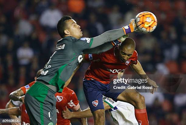 Danilo of Chapecoense fights for the ball with Diego Daniel Vera of Independiente during a first leg match between Independiente and Chapecoense as...