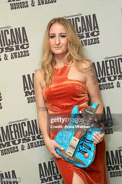 Margo Price poses backstage with her Emerging Artist of the Year Award at the Americana Honors & Awards 2016 at Ryman Auditorium on September 21,...