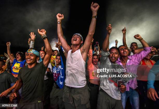 Members of the Revolutionary Armed Forces of Colombia guerrilla dance during a cultural event held at their encampment in Llanos del Yari, Caqueta...