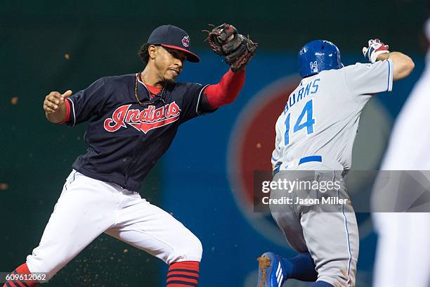 Shortstop Francisco Lindor of the Cleveland Indians tags out Billy Burns of the Kansas City Royals to end the top of the fourth inning at Progressive...