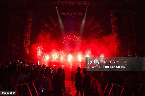 In this picture taken on September 19, 2016 shows electronic music show during the Japan Ultra Music Festival at Odaiba Ultra Park in Tokyo. - A...