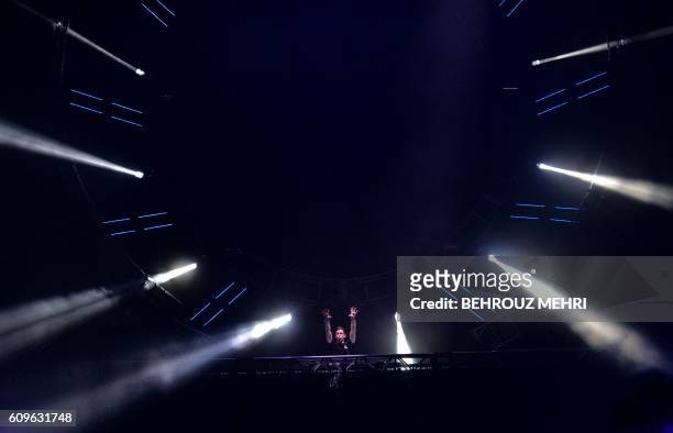 In this picture taken on September 18, 2016 Dutch DJ Hardwell performs during the Japan Ultra Music Festival at Odaiba Ultra Park in Tokyo. - A...