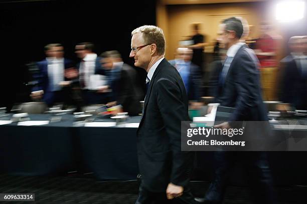 Philip Lowe, governor of the Reserve Bank of Australia, leaves a hearing before the House of Representatives economics committee in Sydney,...