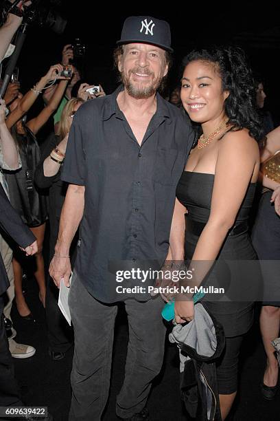 Larry Clark and Tiffany Limos attend MARC JACOBS Spring 2008 Collection at The New York State Armory on September 10, 2007 in New York City.