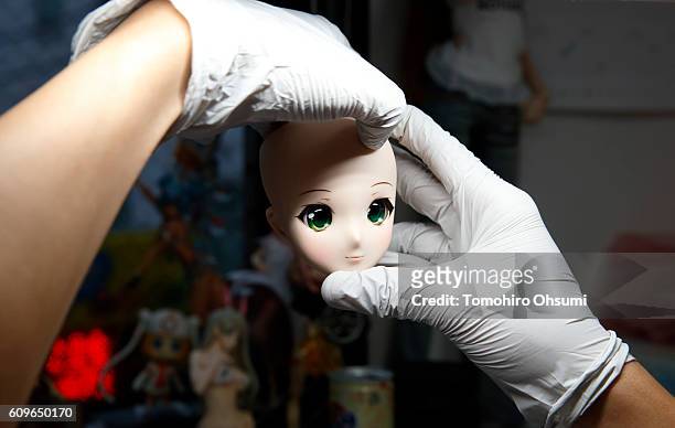 An employee checks a smart doll at the Mirai Store Tokyo on August 22, 2016 in Tokyo, Japan. Isetan Mitsukoshi Holdings Ltd. Re-opens ISETAN The...