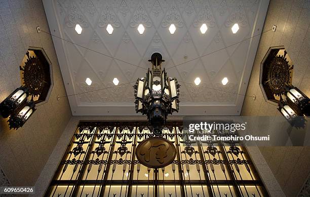 Signage is displayed at the entrance to the Isetan Shinjuku department store on August 22, 2016 in Tokyo, Japan. Isetan Mitsukoshi Holdings Ltd....