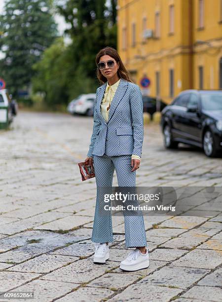 Negin Mirsalehi wearing a Gucci suit is seen outside Gucci during Milan Fashion Week Spring/Summer 2017 on September 21, 2016 in Milan, Italy.