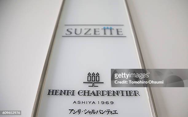 Signage for Henri Charpentier is displayed at the entrance to its factory on August 17, 2016 in Yokohama, Japan. Isetan Mitsukoshi Holdings Ltd....