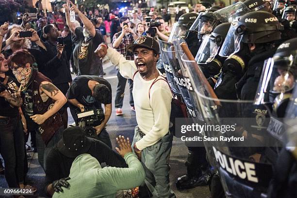 Demonstrator shouts during protests September 21, 2016 in downtown Charlotte, NC. Protests in Charlotte began on Tuesday in response to the fatal...