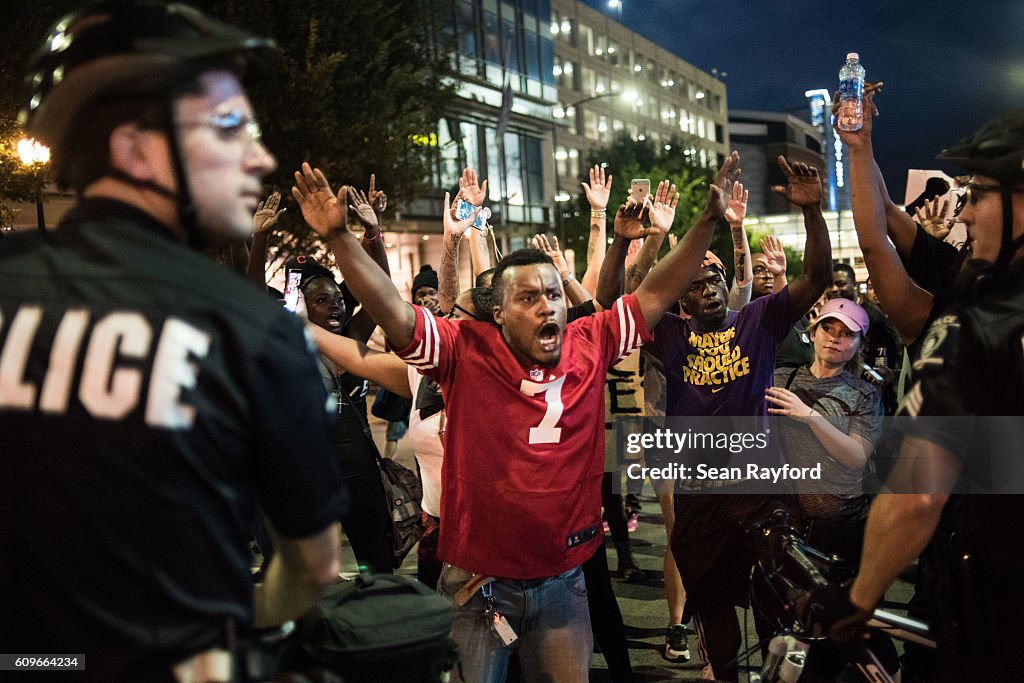 Charlotte Riots Protestors shout at police officers September 21, 2016 in Charlotte ...