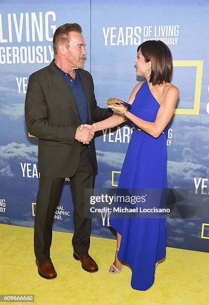 Actor Arnold Schwarzenegger and TV personality Bethenny Frankel attend National Geographic's "Years Of Living Dangerously" new season world premiere...