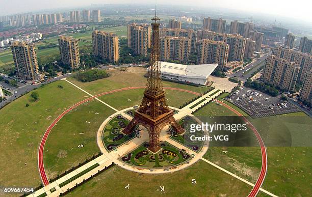 Aerial view of Eiffel Tower replica under which plastic track and green land are laid on September 22, 2016 in Hangzhou, Zhejiang Province of China....
