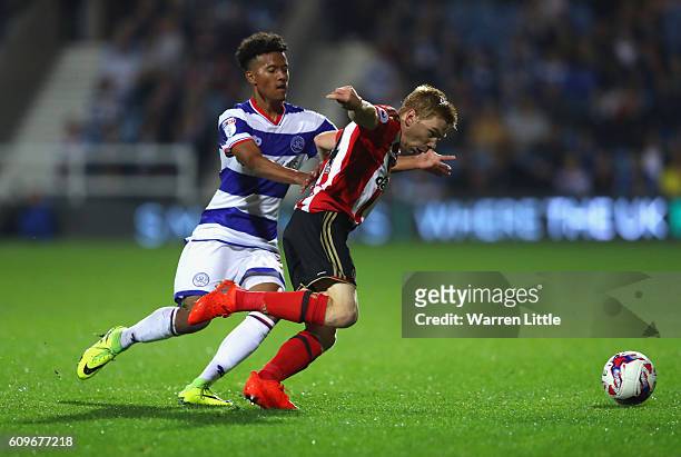 Ducan Watmore of Sunderland is tackled by Nicholas Hamalainen of Queens Park Rangers during the EFL Cup Third Round match between Queens Park Rangers...