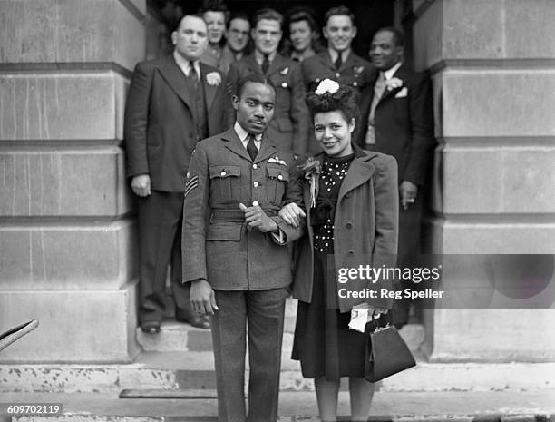 Sergeant Owen Sylvester of the West Indies, with Laureen Goodare of St Pancras, after their wedding at St Pancras Town Hall, London, 21st October...