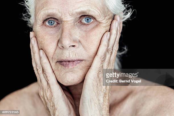 senior woman - pain face stock-fotos und bilder
