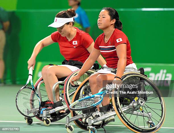 Yui Kamji and Miho Nijo of Japan show their dejection after Women's Doubles Bronze Medal Match against Lucy Shuker and Jordanne Whiley of Great...