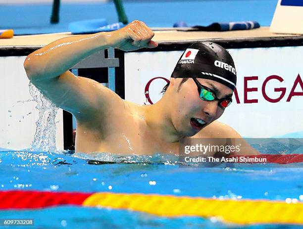 Takuro Yamada of Japan celebrates winning the bronze medal in the Men's 50m Freestyle - S9 Final on day 6 of the 2016 Rio Paralympic Games at the...