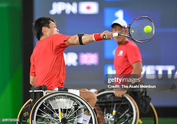 Shingo Kunieda of Japan plays a backhand during the Wheelchair Tennis Men's Doubles Semifinal against Alfie Hewett and Gordon Reid of Great Britain...