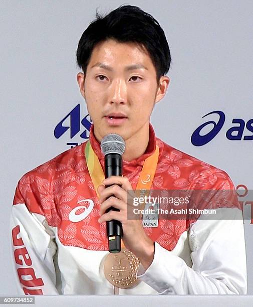 Men's 4x100m Relay - T42-47 bronze medalist Hajimu Ashida of Japan speaks during a Japanese medalists press conference on day 6 of the 2016 Rio...