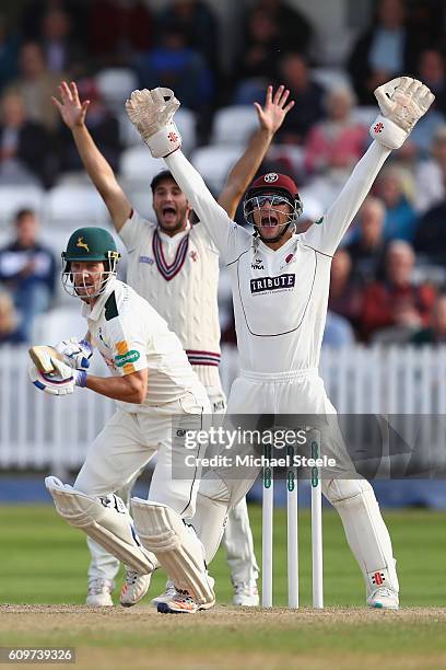 Ryan Davies of Somerset appeals successfully for the lbw wicket of Chris Read off the bowling of Jack Leach during day three of the Specsavers County...