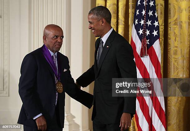 President Barack Obama presents the National Medal of Arts to record producer and songwriter Berry Gordy during an East Room ceremony at the White...