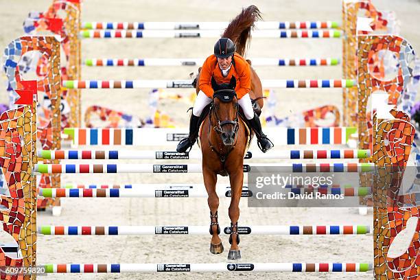 Gerco Schroder of The Netherlands rides Glock's London N.O.P during the CSIO Barcelona Furusiyya FEI Nations Cup Jumping Final First Round at the...