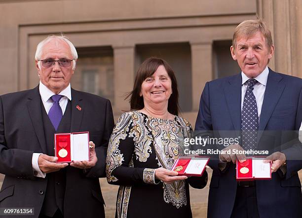 Trevor Hick, Margaret Aspinall and Kenny Dalglish pose with Freedom of the City of Liverpool medals outside St George's Hall on September 22, 2016 in...