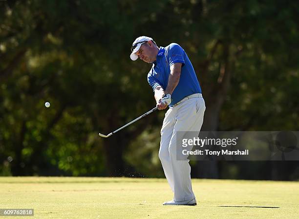 Andrew Rhodes of Keighley Golf Club chips onto the 9th green during the Lombard Trophy Final Day One at Pestana Vila Sol Golf Resort on September 22,...
