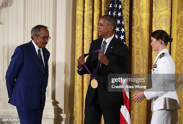 President Barack Obama presents the National Medal of Arts to painter Jack Whitten during an East Room ceremony at the White House September 22, 2016...