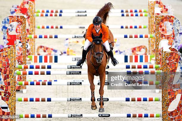 Gerco Schroder of The Netherlands rides Glock's London N.O.P during the CSIO Barcelona Furusiyya FEI Nations Cup Jumping Final First Round at the...