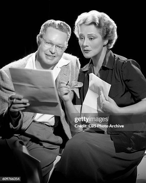 Left to right, producer Gordon Hughes and actress Irene Rich. She portrays the character Faith Chandler in Dear John, one of the Irene Rich Dramas on...