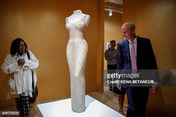 Actress Whoopi Goldberg and Martin Nolan, Executive Director of Julien's Auctions speak next to the Marilyn Monroe iconic "Happy Birthday Mr....