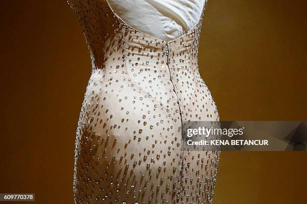 Former actress Marilyn Monroe's iconic "Happy Birthday Mr. President" dress is viewed during a press preview at MANA Contemporary Museum in Jersey...