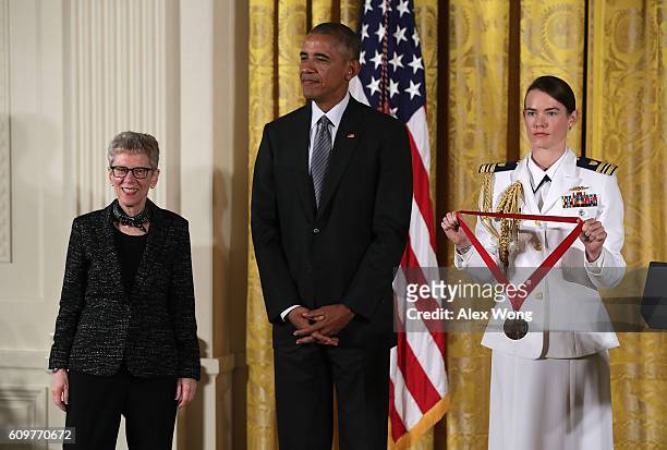 President Barack Obama presents the National Humanities Medal to radio host Terry Gross during an East Room ceremony at the White House September 22,...