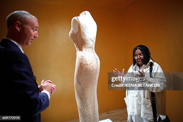 Actress Whoopi Goldberg and Martin Nolan, Executive Director of Julien's Auctions speak next to the Marilyn Monroe iconic "Happy Birthday Mr....