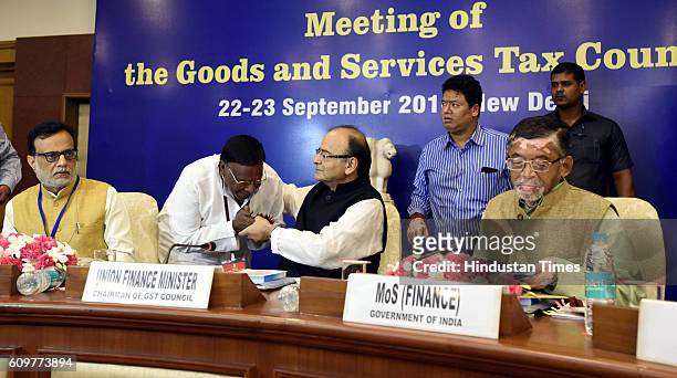 Finance Minister Arun Jaitley meets with Chief Minister of Puducherry V. Narayanasamy as Financial Services Secretary Hasmukh Adhia, Union Minister...