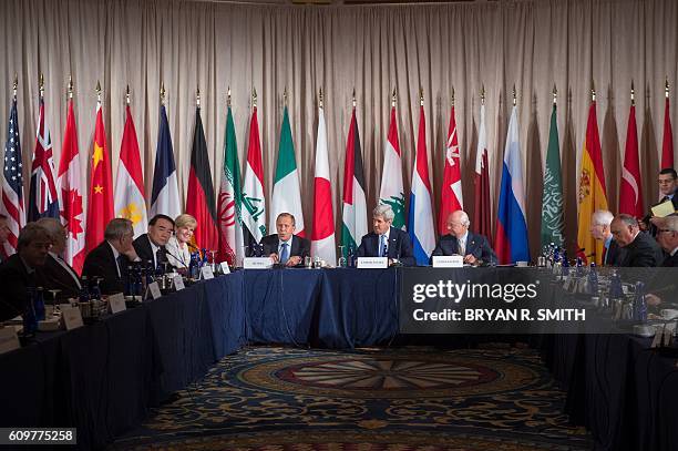 Russian Foreign Minister Sergei Lavrov US Secretary of State John Kerry and United Nations Special Envoy for Syria Staffan Mistura attend the...