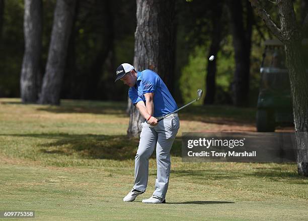 Luke Roberts of Keighley Golf Club plays his second shot on the 18th fairway during the Lombard Trophy Final Day One at Pestana Vila Sol Golf Resort...