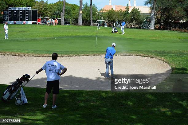 Luke Roberts of Keighley Golf Club plays out of a bunker on the 18th green during the Lombard Trophy Final Day One at Pestana Vila Sol Golf Resort on...