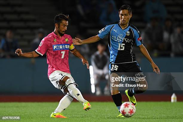 Yuto Sato of JEF United Chiba#7 and Riki Harakawa of Kawasaki Frontale#15 compete for the ball during the Emperor's Cup third round match between...
