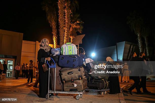 Palestinian Hajj pilgrims returning from Mecca re- enter Gaza, through the Rafah border crossing on September 22 after the Egyptian authorities...