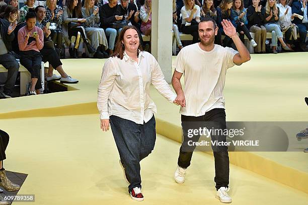 Fashion designers Marta Marques and Paulo Almeida walk the runway at the Marques Almeida show during London Fashion Week Spring/Summer collections...